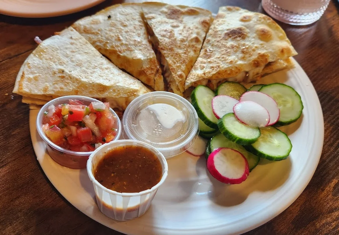 Quesadillas and Empanadas - Traditional Mexican dishes at Taqueria El Chingon